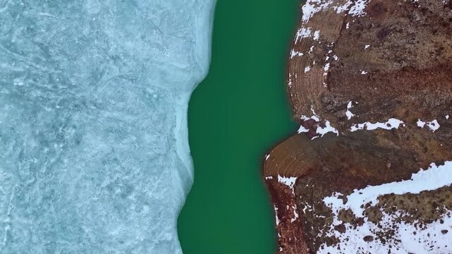 Abstract Aerial Composition of Ice Edge Meeting Emerald Water
