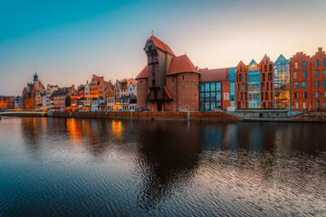 Gdansk with Motlawa river in Poland. Old town colourful house with Zuraw or crane and with Holy Spirit Gate © Zedspider