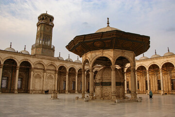 Fototapeta premium Tourist walking in the Mosque Muhammad Ali in Cairo Egypt 