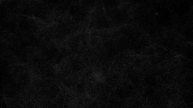 Fine particle spray of micro droplets, water mist, dust and snow rising upward in the air. Atmospheric drifting particles forming a subtle fog or blizzard effect. Seamless loop with alpha channel, 4K.