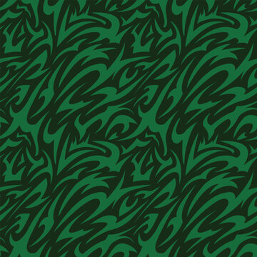 Seamless green camouflage pattern with sharp tribal tattoo shapes. Perfect for military apparel, bandanas, gift wrap, packaging, notebook covers, and modern wallpaper designs.