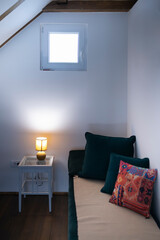 Image of a rustic sofa with a nightstand.