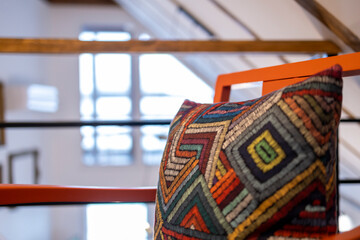 Detail of a modern pillow with geometric ornaments.
