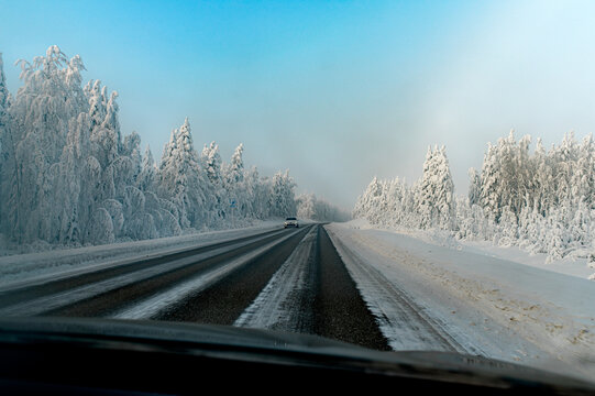 A view from a car on an icy road in Lapland, Finland