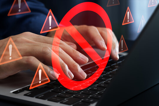 Insecure actions and compliance violations. Prohibition sign and warning icons. Security risks and unsafe behavior. Businessman causing regulatory breach on laptop computer.