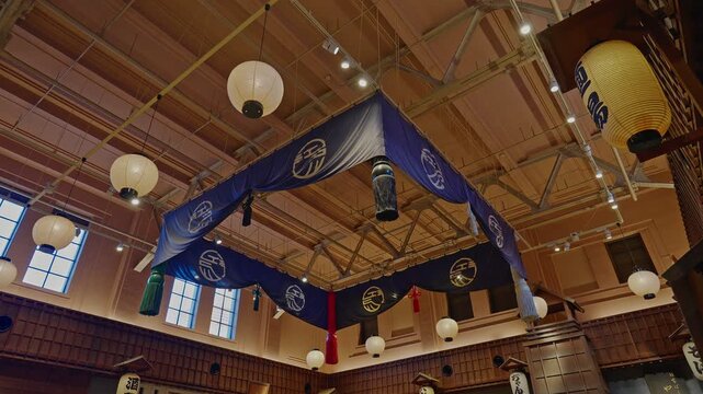Interior view of Ryogoku Edo Noren in Tokyo. Features traditional Japanese architecture with hanging lanterns and Edo-style decorative banners.