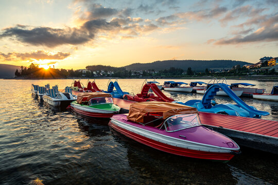 Paddleboats on Lake Schluchsee in the Black Forest in Southern Germany during beautiful sunset