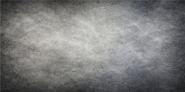 A dark aged wallpaper features a grunge brushed metal plate texture with a gray weathered surface and a rough vintage concrete pattern for a dirty industrial backdrop