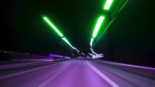 Nighttime Drive Through Illuminated Road Lights With Motion Blur Effects. Hyperlapse Road Trip. Driving Along a Highway at Night Featuring Bright Streetlights Overhead and Motion Blur Effects.