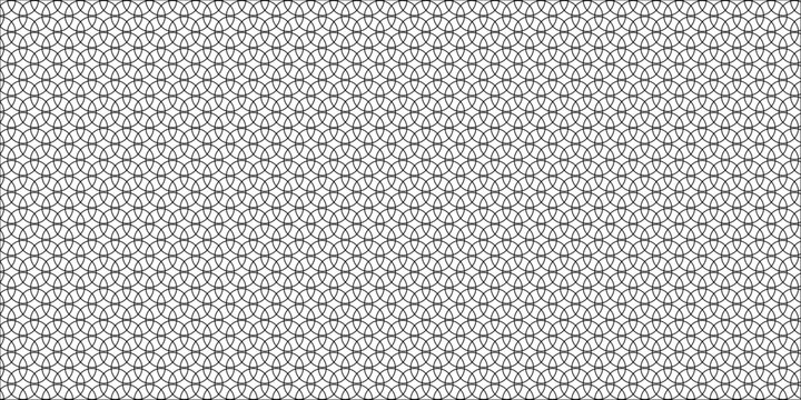 Seamless geometric pattern of black and white carbon fiber fabric with a textured metal surface design for a grey textile backdrop