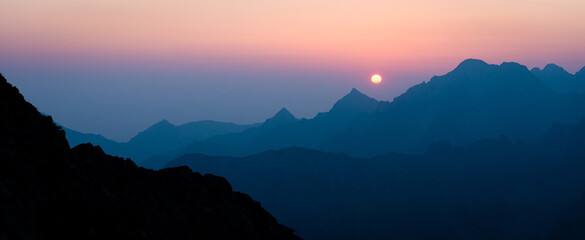 Naklejka premium Violet sunrise in the mountains of High Tatras, Slovakia