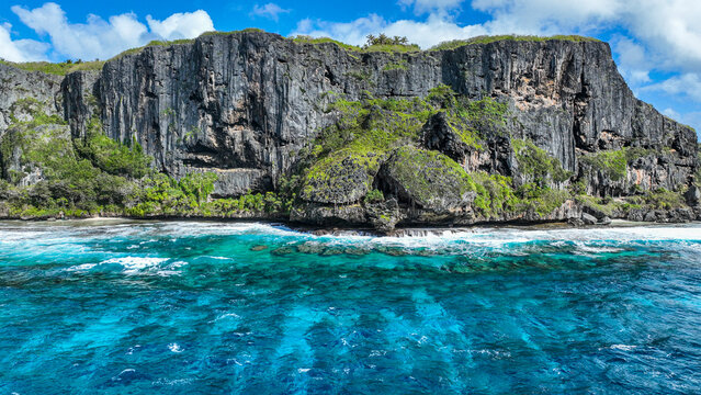 Aerial view of la gueule du monstre sea cave Rurutu Austral Islands