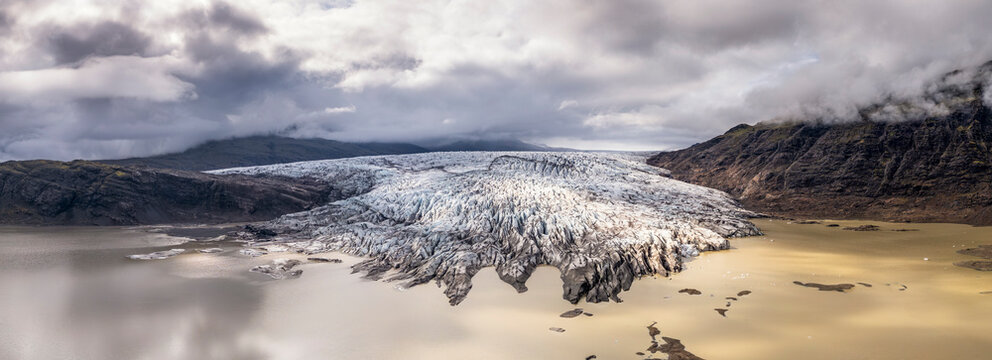 High drone view of Fl�aj�kull Glacier flowing into Heinabergsl�n lagoon in Iceland