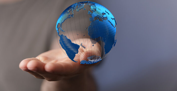 Person holding a digital earth, representing global connection, technology, and the future. Perfect for concepts of glob