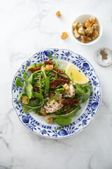 Green salad with tomatoes and cream cheese