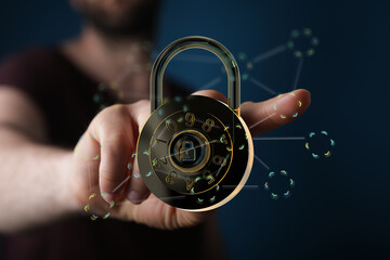 Concept of cybersecurity, data protection, and digital safety. Featuring hand touching a padlock icon with a network gra © vegefox.com