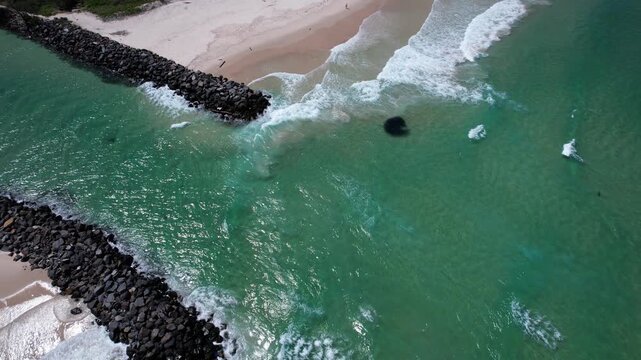 Baitfish Swimming Near The Mooball Creek Mouth In Pottsville, NSW, Australia. - aerial shot