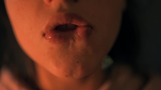 Vivid image of smiling woman showcasing tongue and pouting lips