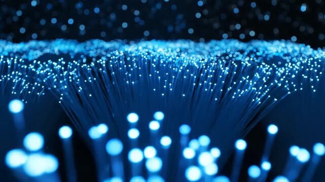 Optical fibers transmitting data through glowing blue light pulses in a futuristic technology environment