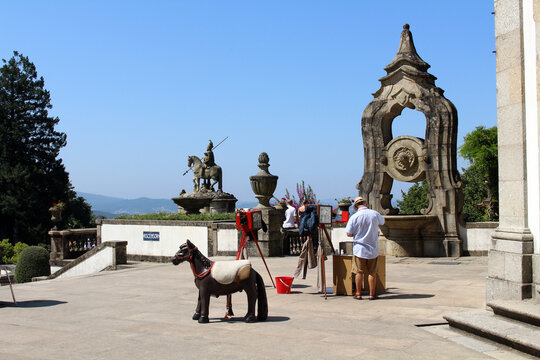 Photographer Offering Services Basilica of Bom Jesus do Monte Entrance August 2024 Street scene with horse toy prop