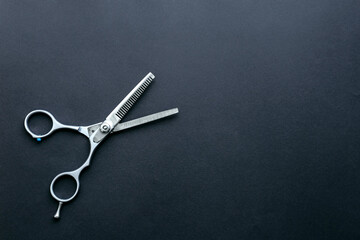 Professional Thinning Hairdressing Scissors on Dark Background