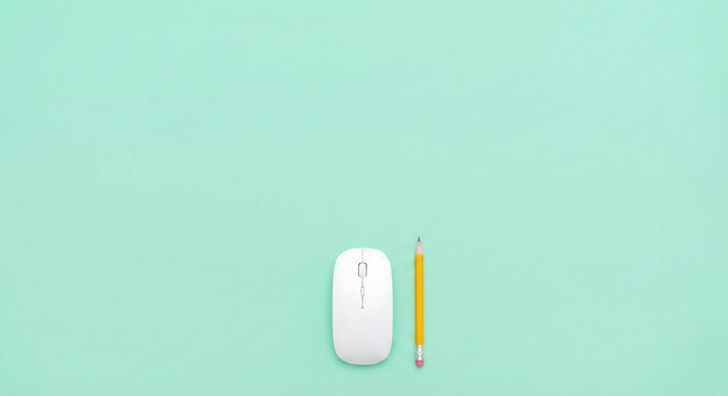 White computer mouse and yellow pencil on mint green background, flat lay desktop workspace