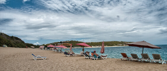 SAINT MAARTEN, DUCTH ANTILLES - FEB 27: Tourists on the island, February 27, 2010 in Saint Maarten. More than 1 million people visit the island each year