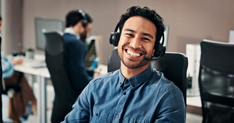 Fototapeta premium Contact us, portrait and happy man in call center for business, banking support or coworking. Help desk, smile or agent with headset for customer service, account feedback or financial credit score