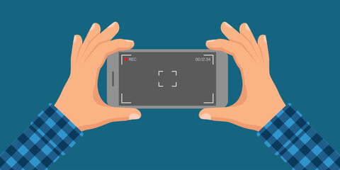 Recording Moment: Capturing the world through the lens of a smartphone, two hands hold the device steady, ready to record. © Rahed Ul Islam