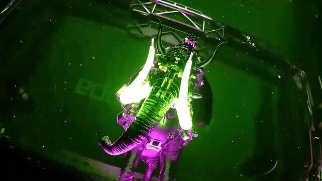 A futuristic 3d animation showcasing a glowing robot DJ delivering an immersive 3d video VJ loop, creating an electrifying digital concert experience