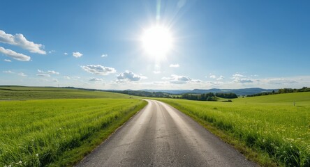 Fototapeta premium Wide meadow expanse highlighted by a central small road pathway