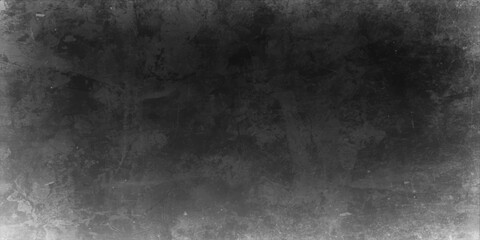Obraz premium Abstract black and white grunge background featuring a dark textured stone wall with an old vintage concrete pattern and a dirty grey paper surface design
