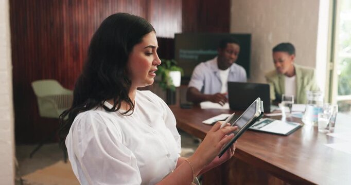 Business, woman and meeting with tablet in office for discussion, proofreading and feedback. People, talk and copywriting with research on tech, team planning and editing draft for article submission