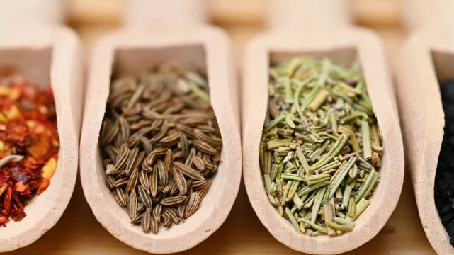 capturing a diverse collection of aromatic dried spices, including pungent chili flakes