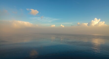 Fototapeta premium Morning sky with white clouds over flowing river