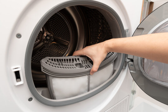 Cleaning dryer lint filter. Laundry dryer