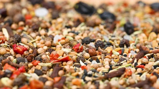 capturing a diverse collection of aromatic dried spices, including pungent chili flakes