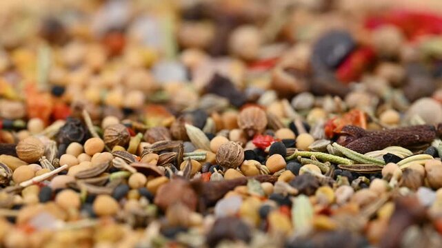 capturing a diverse collection of aromatic dried spices, including pungent chili flakes