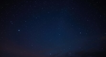 Obraz premium Peaceful night sky decorated with faint stars and gentle ambient lighting backdrop