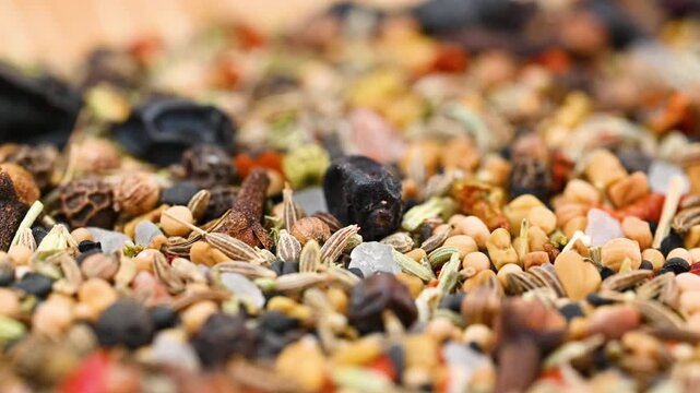 capturing a diverse collection of aromatic dried spices, including pungent chili flakes