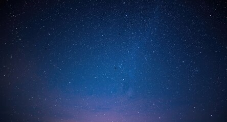 Fototapeta premium Star filled night sky glowing with soft shimmering lights