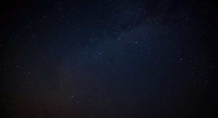 Obraz premium Distant stars glowing softly in the vast cosmos