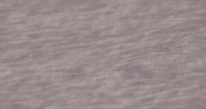 natural cotton with tightly intertwined threads for making garments, wide light-colored fabric for sewing sweatshirts, T-shirts and other clothing
