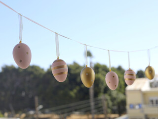 Pastel Easter Egg Garland Hanging Outdoors