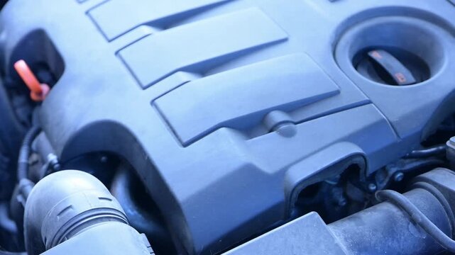 Starter operation during the first start of a diesel engine. Under the hood, showcasing precision engineering and the complexity of automotive technology.