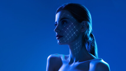 High tech poster side portrait woman with illuminated facial grid in blue light. Concept of...