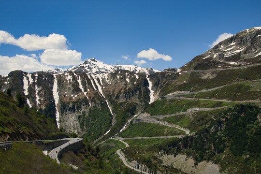 Snow melting on mountain peaks above the Furka Pass (Furkapass) in the Swiss Alps, Switzerland