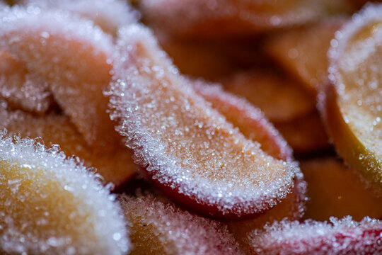 Full frame close-up of frozen slices of orange