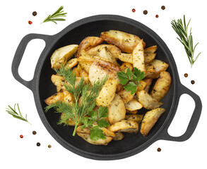 Baked potatoes in a cast iron cauldron with dill and parsley