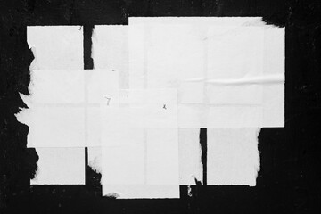 Obraz premium Blank, mockup, old city poster on a black background close-up
